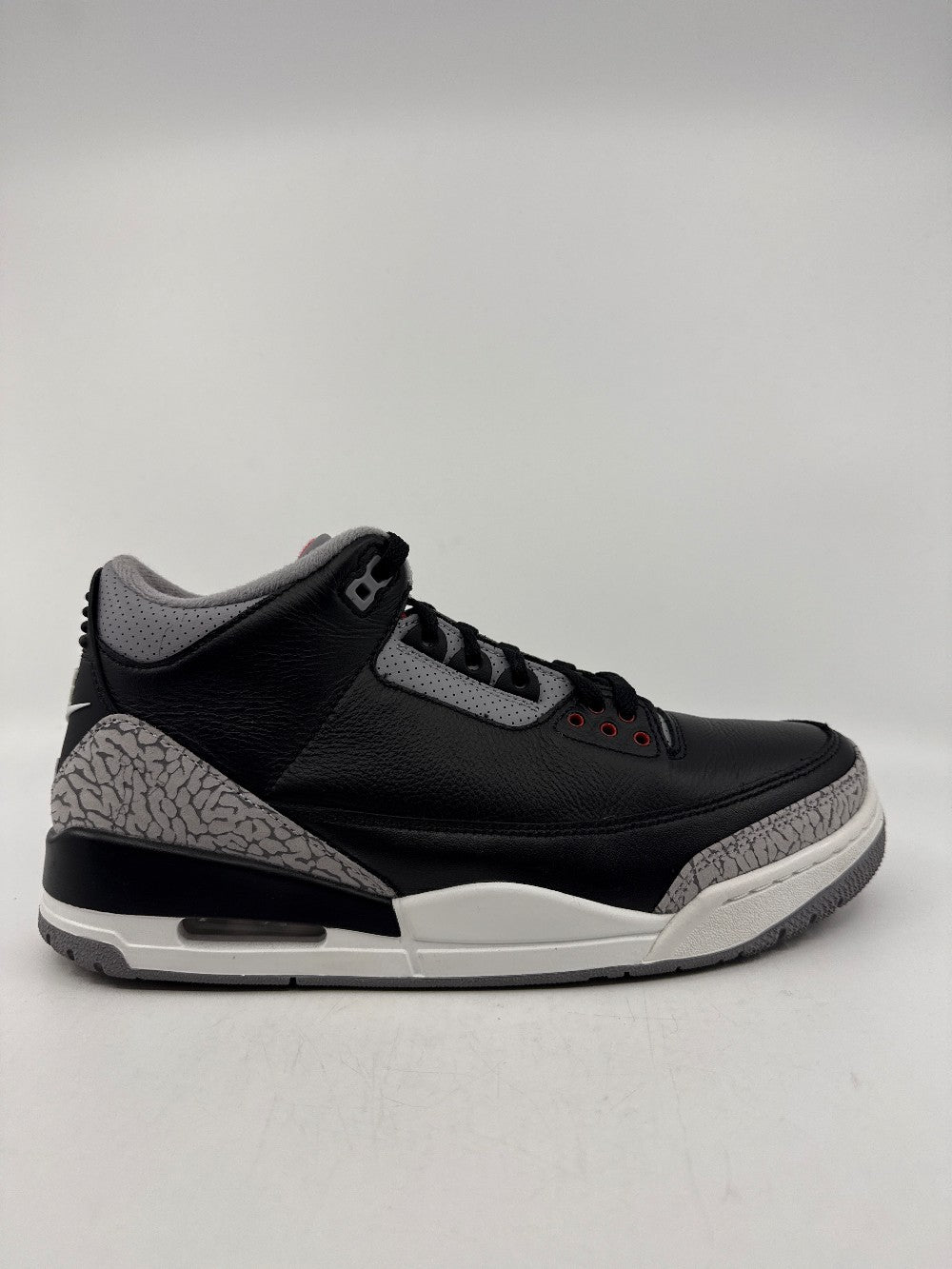 *USED* AJ 3 - BLACK CEMENT|39610